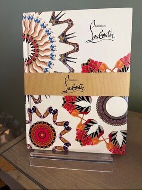 Christian Louboutin White Notebook with Red, Orange, Brown, and Black Accents